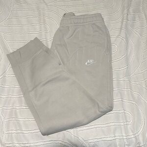 Light cream colored, nike sweatpants, men’s large.